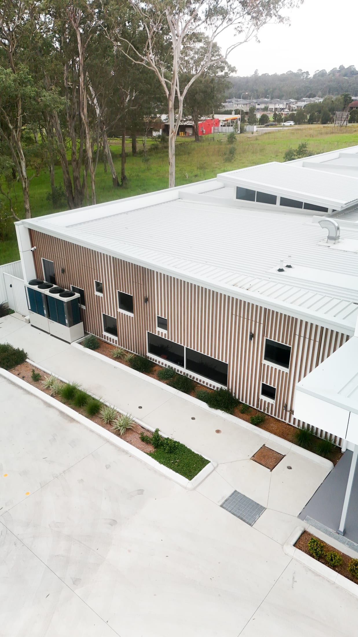 Leppington Childcare timber-look batten facade — photo 11