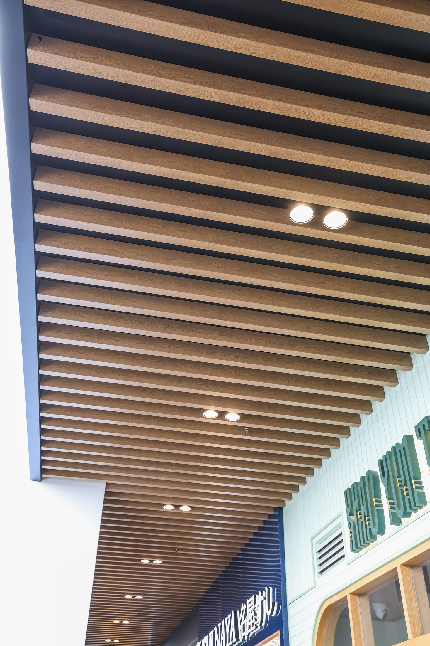 Redfern commercial timber-look batten facade — photo 2